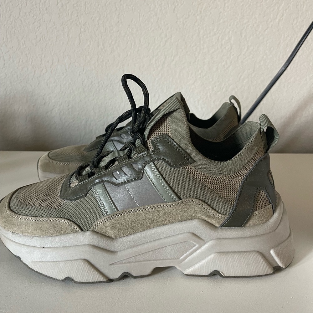 Chunky green sneakers.
